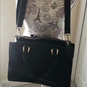 Charming black hand bag by Charming Charlie